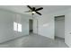 Bright bedroom with ceiling fan, wood-look floors, and ample closet space at 4522 N 14Th Ave, Phoenix, AZ 85013