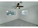 Bedroom with ceiling fan and two windows, great natural light at 4522 N 14Th Ave, Phoenix, AZ 85013