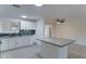Updated kitchen featuring white shaker cabinets, granite countertops and tile backsplash at 4522 N 14Th Ave, Phoenix, AZ 85013