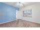 Second bedroom with wood-look floors and blue accent wall at 1351 N Pleasant Dr # 1098, Chandler, AZ 85225