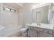 Clean bathroom with tub, toilet and vanity at 1351 N Pleasant Dr # 1098, Chandler, AZ 85225