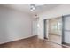 Bedroom with mirrored closet doors and wood-look floors at 1351 N Pleasant Dr # 1098, Chandler, AZ 85225