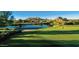 Golf course with water feature and mountain views at 10629 E Troon North Dr, Scottsdale, AZ 85262