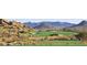 Picturesque golf course with desert landscape at 10629 E Troon North Dr, Scottsdale, AZ 85262