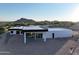 Aerial view of a modern home with mountain views at 3525 S Kings Ranch Ct # 4, Gold Canyon, AZ 85118