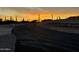 Curving road into a desert community at sunset at 3525 S Kings Ranch Ct # 4, Gold Canyon, AZ 85118
