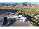 Stunning aerial view of a luxury home in a mountain setting at 3525 S Kings Ranch Ct # 4, Gold Canyon, AZ 85118