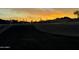 Entrance to a desert community at sunset with saguaro cacti at 3525 S Kings Ranch Ct # 4, Gold Canyon, AZ 85118