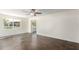 Bright living room features tile flooring and a ceiling fan at 1401 E Osborn Rd, Phoenix, AZ 85014