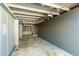 Unfinished garage with high ceilings and potential for various uses at 1401 E Osborn Rd, Phoenix, AZ 85014