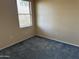 Spacious bedroom with carpeted floor and window with blinds at 17626 W Calistoga Dr, Surprise, AZ 85387