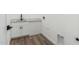 Bright laundry room with white cabinets and quartz countertop at 31712 N 169Th Ave, Surprise, AZ 85387