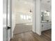 Spacious bedroom with carpet flooring and access to ensuite bathroom at 31712 N 169Th Ave, Surprise, AZ 85387