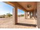 Covered patio with brick pavers and ceiling fan at 31712 N 169Th Ave, Surprise, AZ 85387