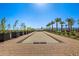 Community bocce ball court with surrounding landscaping at 17227 W Middlebury St, Surprise, AZ 85388