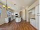 Modern kitchen featuring white cabinets, granite counters, and an island at 3691 S Barberry Pl, Chandler, AZ 85248