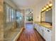 Bathroom with double vanity, granite countertop, and large walk-in shower at 3691 S Barberry Pl, Chandler, AZ 85248