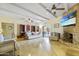 Bright living room featuring a stone fireplace at 8023 E Cholla St, Scottsdale, AZ 85260