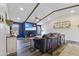 Modern living room with a large TV and stylish decor at 8023 E Cholla St, Scottsdale, AZ 85260