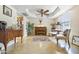 Charming sitting area with piano and comfortable chairs at 8023 E Cholla St, Scottsdale, AZ 85260