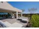 Relaxing patio with comfortable seating and mountain views at 17807 E Silver Sage Ln, Rio Verde, AZ 85263