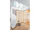 Bright, spacious closet with custom shelving and hanging at 41851 N 112Th Pl, Scottsdale, AZ 85262