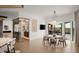 Elegant dining room with a round table and access to backyard at 41851 N 112Th Pl, Scottsdale, AZ 85262