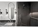 Contemporary bathroom with a walk-in shower and marble finishes at 41851 N 112Th Pl, Scottsdale, AZ 85262