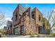 Modern home with stone exterior, private balcony, and two-car garage at 37200 N Cave Creek Rd # 2124, Scottsdale, AZ 85262