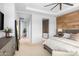 Main bedroom with king bed, en-suite bathroom, and walk-in closet at 37200 N Cave Creek Rd # 2124, Scottsdale, AZ 85262
