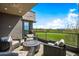 Relaxing patio with fire pit and wicker seating offering stunning views at 37200 N Cave Creek Rd # 2124, Scottsdale, AZ 85262