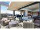 Spacious outdoor patio with seating area, fire pit, and views at 37200 N Cave Creek Rd # 2124, Scottsdale, AZ 85262