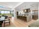 Modern kitchen with large island, marble countertops, and high-end appliances at 37200 N Cave Creek Rd # 2124, Scottsdale, AZ 85262