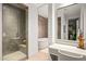 Bathroom boasts a walk-in shower, soaking tub, and a large mirror at 37200 N Cave Creek Rd # 2124, Scottsdale, AZ 85262