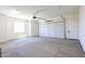Spacious two-car garage with high ceilings and epoxy floors at 723 N Moon Rd, Apache Junction, AZ 85119
