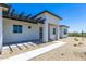 Front entry with pergola and walkway to the front door at 723 N Moon Rd, Apache Junction, AZ 85119