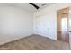 Spacious bedroom with sliding closet doors and neutral decor at 723 N Moon Rd, Apache Junction, AZ 85119