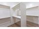 Large walk-in closet with ample shelving and hanging space at 723 N Moon Rd, Apache Junction, AZ 85119
