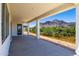 Covered patio with mountain views and desert landscaping at 723 N Moon Rd, Apache Junction, AZ 85119