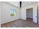 Bedroom with ceiling fan and access to hallway at 723 N Moon Rd, Apache Junction, AZ 85119
