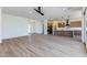 Open concept kitchen with modern island, stainless steel appliances, and wood cabinets at 723 N Moon Rd, Apache Junction, AZ 85119