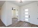 Open entryway with modern door and view to an additional room at 723 N Moon Rd, Apache Junction, AZ 85119