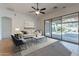 Bright living room with sliding doors to backyard at 18449 W Piedmont Rd, Goodyear, AZ 85338