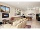 Spacious game room featuring a pool table, arcade game, and seating area at 11070 E Rolling Rock Dr, Scottsdale, AZ 85262
