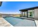 Clean lines and modern design highlight this inviting pool area at 13188 E Desert Holly Dr, Scottsdale, AZ 85255