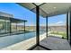 Luxury pool with mountain views, visible through glass doors at 13188 E Desert Holly Dr, Scottsdale, AZ 85255