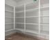 Large walk-in pantry with ample shelving for storage at 8351 E Monte Ave, Mesa, AZ 85209