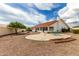 Backyard with patio, gravel, and a raised garden bed at 8351 E Monte Ave, Mesa, AZ 85209