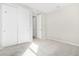Bright bedroom with double door closet and carpet flooring at 18741 E Elizar Dr, Gold Canyon, AZ 85118