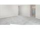 Bedroom with grey carpet and access to bathroom at 18741 E Elizar Dr, Gold Canyon, AZ 85118